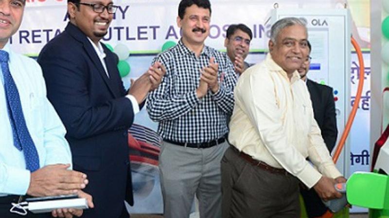 Indian Oil Corporation (IOC) has collaborated with app-based taxi aggregator Ola to launch the country's first electric charging station at one of its petrol/diesel stations in Nagpur. (Photo: ANI) Indian Oil Corporation (IOC) has collaborated with app-based taxi aggregator Ola to launch the country's first electric charging station at one of its petrol/diesel stations in Nagpur. (Photo: ANI)