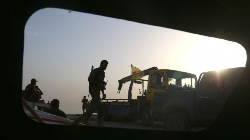 At dawn, IS fighters withdrew from the western-most district towards the other two quarters, said Rami Abdel Rahman, head of the Syrian Observatory for Human Rights. (Photo: AFP) At dawn, IS fighters withdrew from the western-most district towards the other two quarters, said Rami Abdel Rahman, head of the Syrian Observatory for Human Rights. (Photo: AFP)