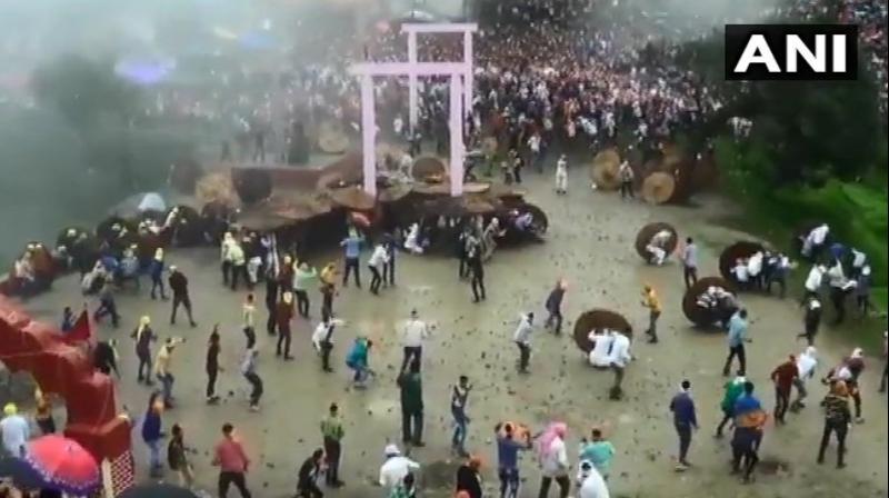 Locals believe that the goddess was pleased only after blood, equivalent to a human sacrifice, is shed during the sport, which was witnessed by thousands of people. (Photo: ANI) Locals believe that the goddess was pleased only after blood, equivalent to a human sacrifice, is shed during the sport, which was witnessed by thousands of people. (Photo: ANI)