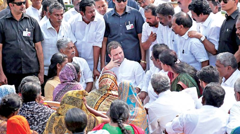 Congress president-elect Rahul Gandhi meets with the families of fishermen affected by Cyclone Ockhi in Kanyakumari on Thursday. (Photo: AP) Congress president-elect Rahul Gandhi meets with the families of fishermen affected by Cyclone Ockhi in Kanyakumari on Thursday. (Photo: AP)