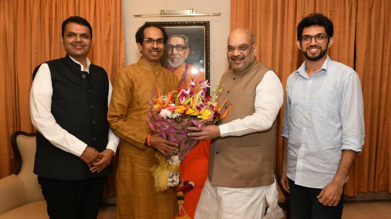 BJP President Amit Shah along with Maharashtra Chief Minister Devendra Fadnavis meets Shiv Sena President Uddhav Thackeray at Matoshree on Wednesday. Also seen Aditya Thackeray. (Photo: DC) BJP President Amit Shah along with Maharashtra Chief Minister Devendra Fadnavis meets Shiv Sena President Uddhav Thackeray at Matoshree on Wednesday. Also seen Aditya Thackeray. (Photo: DC)