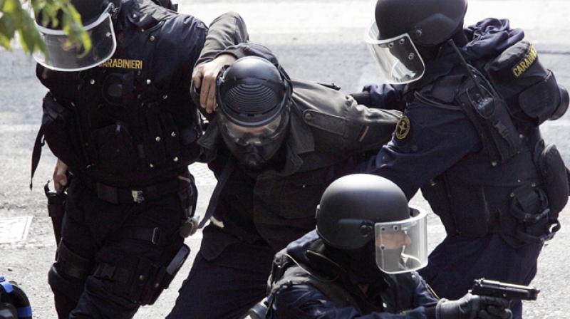 Some 400 officers were deployed as part of an investigation into clandestine immigration, the forgery of residency permits and criminal association. (Photo: Representational Image/AFP) Some 400 officers were deployed as part of an investigation into clandestine immigration, the forgery of residency permits and criminal association. (Photo: Representational Image/AFP)