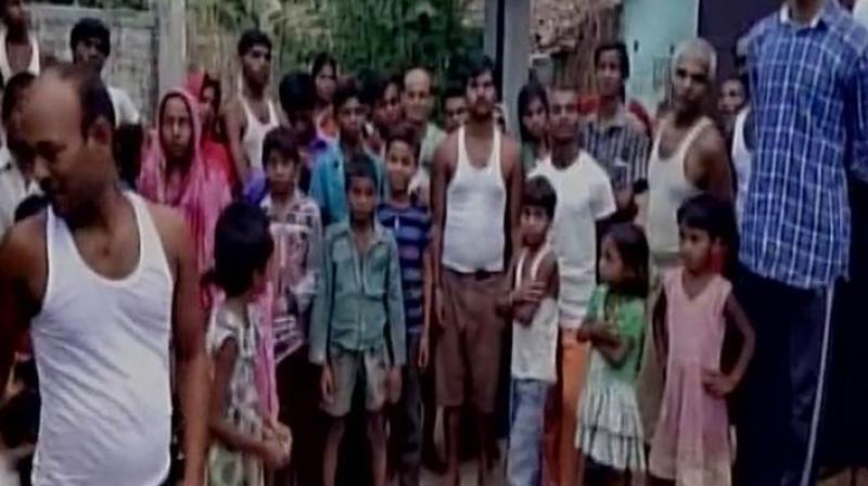 Two minor sisters allegedly stripped by school authorities in Begusarai after their father failed to pay school fee. (Photo: ANI/Twitter) Two minor sisters allegedly stripped by school authorities in Begusarai after their father failed to pay school fee. (Photo: ANI/Twitter)