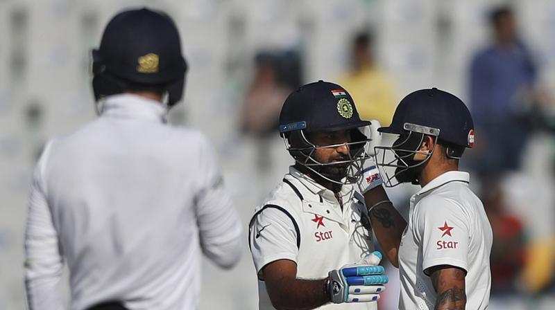 Pujara and Kohli added 75 runs in 25.2 overs. (Photo: PTI) Pujara and Kohli added 75 runs in 25.2 overs. (Photo: PTI)