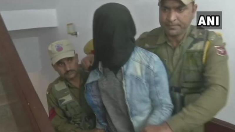 The boy, who will turn 16 on March 12, was apprehended while fleeing after hurling the grenade at the bus stand that left two people dead and 31 others injured Thursday. (Photo: ANI) The boy, who will turn 16 on March 12, was apprehended while fleeing after hurling the grenade at the bus stand that left two people dead and 31 others injured Thursday. (Photo: ANI)