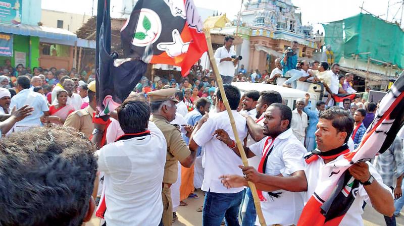 AIADMK men and the DMK-Congress volunteers involved in a clash near Karur on Tuesday following a verbal quarrel at the final round of campaigning. (Image DC) AIADMK men and the DMK-Congress volunteers involved in a clash near Karur on Tuesday following a verbal quarrel at the final round of campaigning. (Image DC)