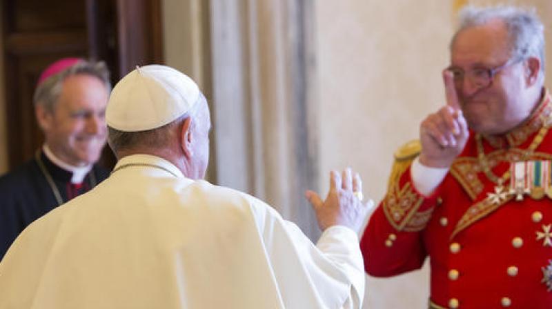 In this June 25, 2015 file photo, Pope Francis greets the Grand Master of the Sovereign Order of Malta Matthew Festing, right, at the end of a private audience in the Pontiff's private library at the Vatican. (Photo: AP) In this June 25, 2015 file photo, Pope Francis greets the Grand Master of the Sovereign Order of Malta Matthew Festing, right, at the end of a private audience in the Pontiff's private library at the Vatican. (Photo: AP)