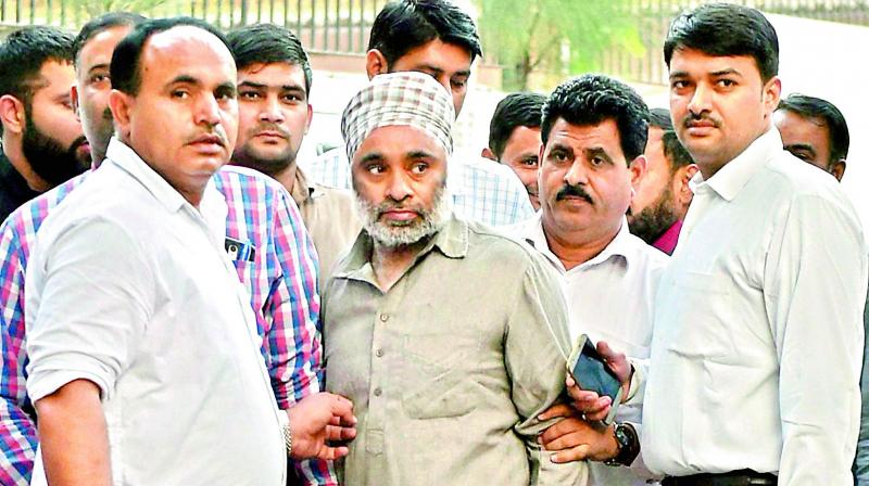 Khalistan Liberation Force chief Harminder Singh Mintoo being produced at Patiala House court in New Delhi on Monday. (Photo: PTI) Khalistan Liberation Force chief Harminder Singh Mintoo being produced at Patiala House court in New Delhi on Monday. (Photo: PTI)