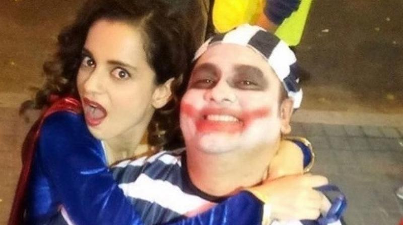 Kangana Ranaut is seen here in a somewhat wacky costume with her Gujarati trainer Suraj Vyas. Kangana Ranaut is seen here in a somewhat wacky costume with her Gujarati trainer Suraj Vyas.