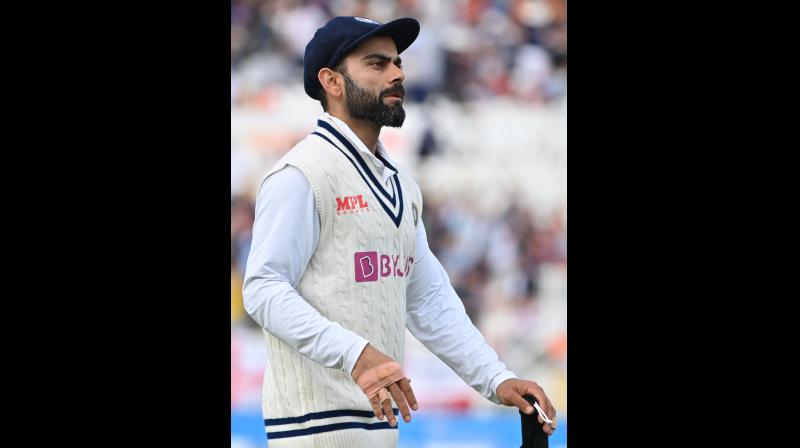 Indias captain Virat Kohli reacts at the end of the innings on the fourth day of the first cricket Test match of the India Tour of England at the Trent Bridge cricket ground in Nottingham, central England, on Saturday. -- AFP