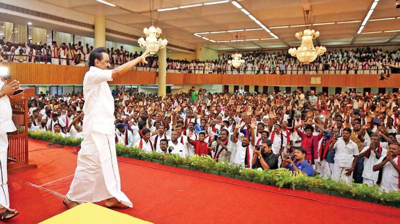 DMK president M.K. Stalin waves to the group of AMMK men led by Bharani Karthikeyan from Pudukkottai district who joined the DMK at the party headquarters here on Saturday. (Photo: DC) DMK president M.K. Stalin waves to the group of AMMK men led by Bharani Karthikeyan from Pudukkottai district who joined the DMK at the party headquarters here on Saturday. (Photo: DC)