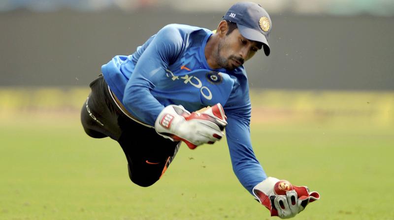 For Saha, more than the historic occasion, it is missing a Test match that is hurting him more. (Photo: PTI) For Saha, more than the historic occasion, it is missing a Test match that is hurting him more. (Photo: PTI)