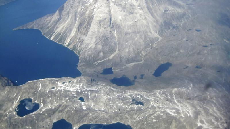 The scope of Wednesday’s ice melt is a number difficult to grasp. To understand just how much ice is being lost, a mere 1 billion tons — or 1 gigaton — of ice loss is equivalent to about 400,000 Olympic-sized swimming pools, the Danish Meteorological Institute said. (Photo: AP) The scope of Wednesday’s ice melt is a number difficult to grasp. To understand just how much ice is being lost, a mere 1 billion tons — or 1 gigaton — of ice loss is equivalent to about 400,000 Olympic-sized swimming pools, the Danish Meteorological Institute said. (Photo: AP)