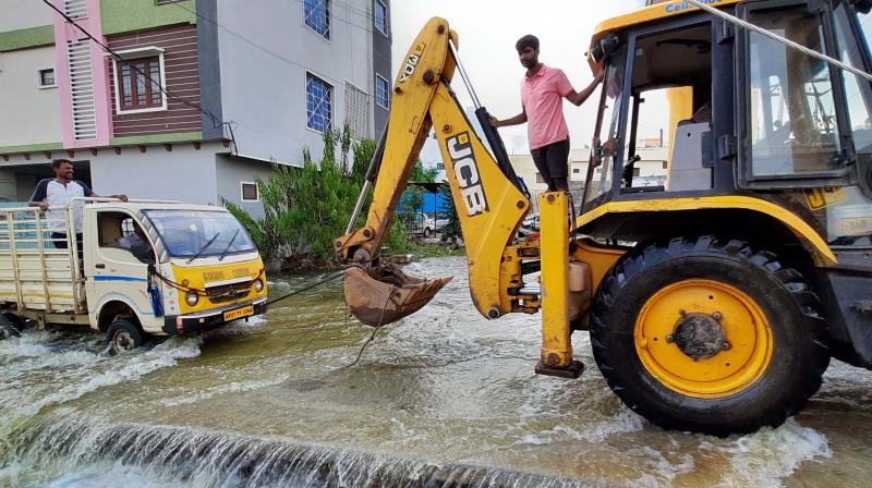 Heavy rains in the last few days hve left many residences resemble swimming pools like these at Jilleliguda colony in Hyderabad.  P Surendra Photo