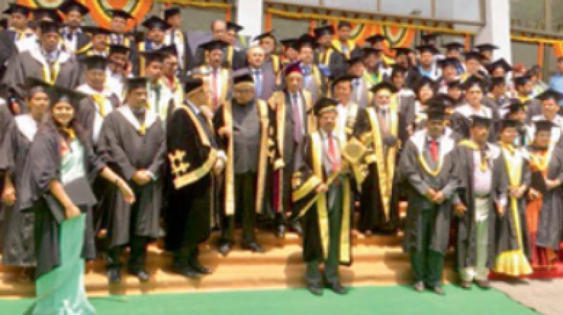 Nalsar graduates pose for photographs during their convocation ceremony on Saturday. —DC Nalsar graduates pose for photographs during their convocation ceremony on Saturday. —DC