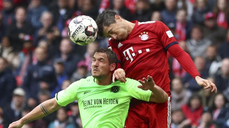 First half goals from Robert Lewandowski, his 22nd of the season in the Bundesliga, and Leon Goretzka put Bayern in control before Jonathas replied and veteran substitute Franck Ribery added Bayern’s third near the end. (Photo: AP) First half goals from Robert Lewandowski, his 22nd of the season in the Bundesliga, and Leon Goretzka put Bayern in control before Jonathas replied and veteran substitute Franck Ribery added Bayern’s third near the end. (Photo: AP)