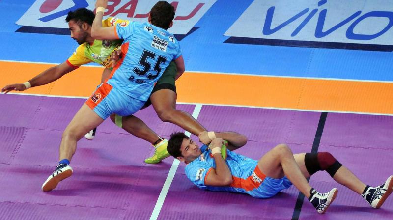 Bengal Warriors players Bhupinder Singh and Srikanth Tewathia tackle Monu Goyat of Patna Pirates (Photo:AP) Bengal Warriors players Bhupinder Singh and Srikanth Tewathia tackle Monu Goyat of Patna Pirates (Photo:AP)
