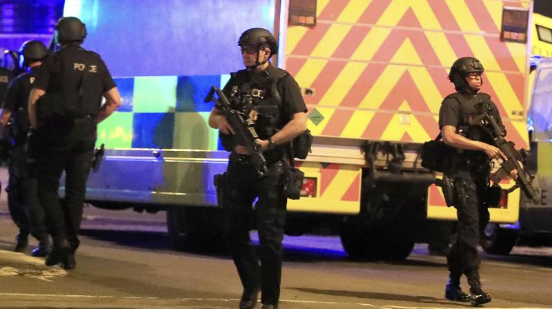 Armed police respond after reports of an explosion at Manchester Arena during an Ariana Grande concert in Manchester, England. (Photo: AP) Armed police respond after reports of an explosion at Manchester Arena during an Ariana Grande concert in Manchester, England. (Photo: AP)