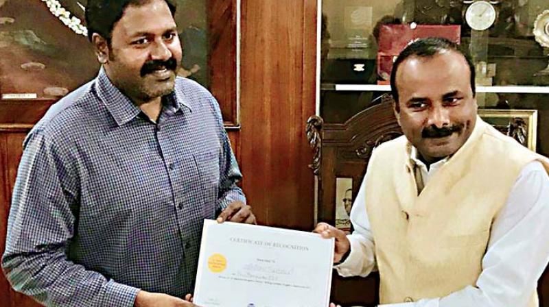 A file photo of Srinivas Alavilli, with former Mayor Sampath Raj A file photo of Srinivas Alavilli, with former Mayor Sampath Raj