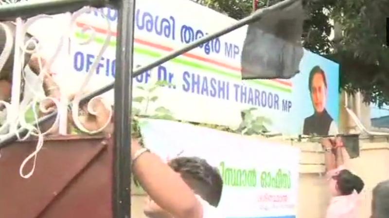 A group of Bhartiya Yuva Morcha activists vandalised Congress MP Shashi Tharoor’s office Monday. (Photo: Twitter/ANI) A group of Bhartiya Yuva Morcha activists vandalised Congress MP Shashi Tharoor’s office Monday. (Photo: Twitter/ANI)