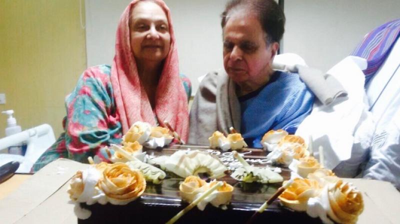 Dilip Kumar shared this picture, captioning it: Saira, helps me cut a cake...(Pic courtesy: Twitter/ TheDilipKumar). Dilip Kumar shared this picture, captioning it: Saira, helps me cut a cake...(Pic courtesy: Twitter/ TheDilipKumar).