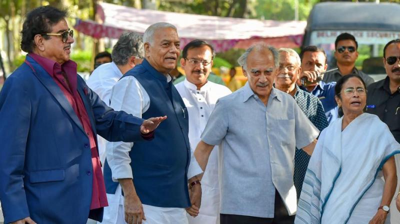 BJP leaders Shatrughan Sinha, Yashwant Sinha and Arun Shourie with West Bengal chief minister Mamata Banerjee in New Delhi on Wednesday. (Photo: PTI) BJP leaders Shatrughan Sinha, Yashwant Sinha and Arun Shourie with West Bengal chief minister Mamata Banerjee in New Delhi on Wednesday. (Photo: PTI)