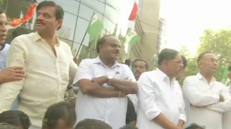 The raids were also carried out at the residences of PWD minister H D Revanna's close associates Narayana Reddy, Ashwath Gowda and Raya Gowda in Hassan, IT sources said. (Image: ANI) The raids were also carried out at the residences of PWD minister H D Revanna's close associates Narayana Reddy, Ashwath Gowda and Raya Gowda in Hassan, IT sources said. (Image: ANI)