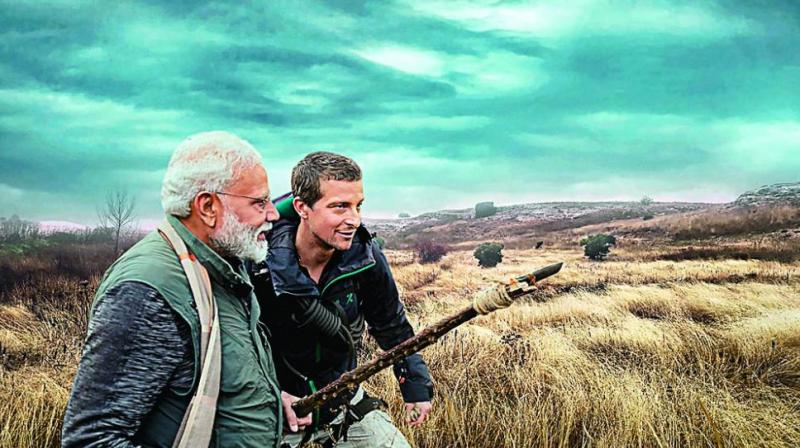 An undated image provided by Discovery channel shows PM Narendra Modi featuring in the channel’s popular franchise Man Vs Wild with world renowned survivalist and adventurer Bear Grylls. (Photo: PTI) An undated image provided by Discovery channel shows PM Narendra Modi featuring in the channel’s popular franchise Man Vs Wild with world renowned survivalist and adventurer Bear Grylls. (Photo: PTI)