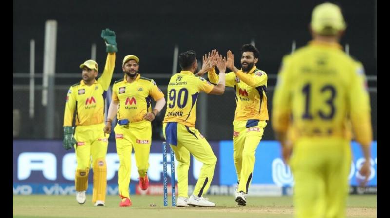 Chennai Super Kings players celebrate a Punjab Kings wicket during their IPL game in Mumbai on Friday.	 Twitter