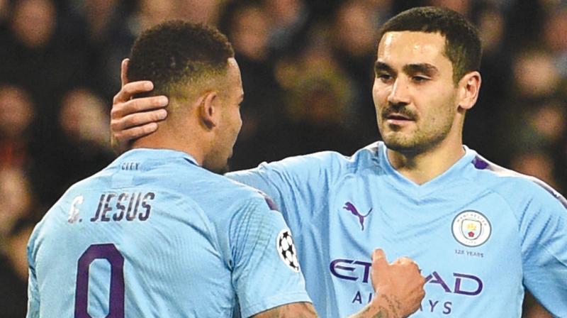 Manchester Citys German midfielder Ilkay Gundogan (R) and striker Jesus. AFP Photo