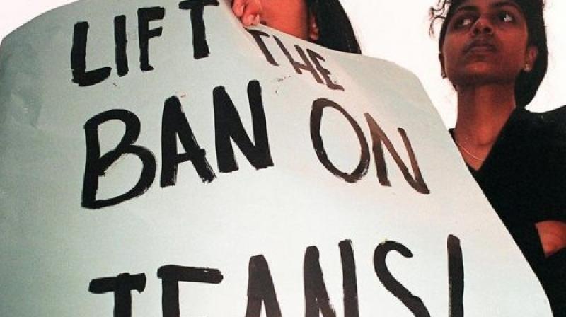 Pinjra Tod, or break the cage, a Delhi-wide campaign is protesting such rules across the country. (Photo: AFP) Pinjra Tod, or break the cage, a Delhi-wide campaign is protesting such rules across the country. (Photo: AFP)