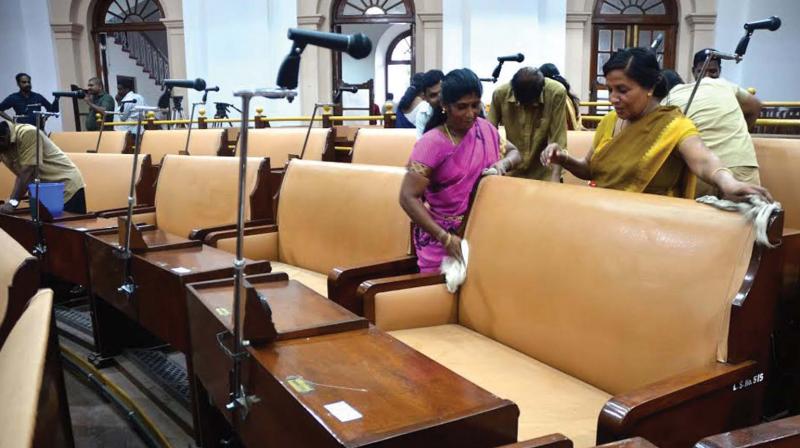 Workers clean old assembly hall on Wednesday. (Photo: DC) Workers clean old assembly hall on Wednesday. (Photo: DC)