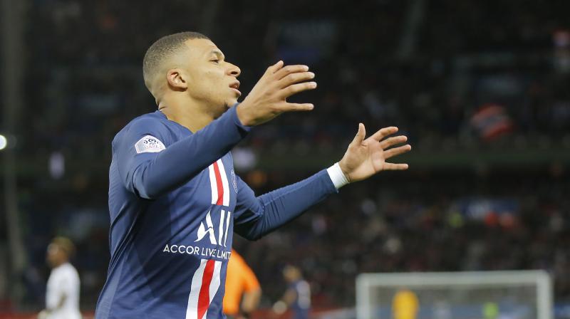 PSGs Kylian Mbappe reacts after missing a scoring chance during a French League One match in the current season. AP Photo