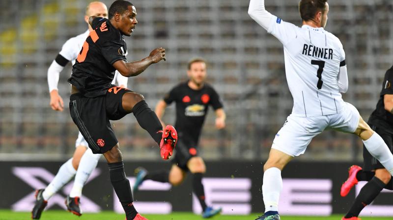 Manchester Uniteds Nigerian striker Odion Ighalo (L) scores the opening goal in the UEFA Europa League last 16, first leg match against Linzer ASK (LASK) in Linz, Austria, on Thursday. AFP Photo