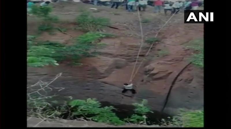 A man who had fallen into a well, two days ago was saved by locals here on Saturday. (Photo: Twitter/ ANI) A man who had fallen into a well, two days ago was saved by locals here on Saturday. (Photo: Twitter/ ANI)