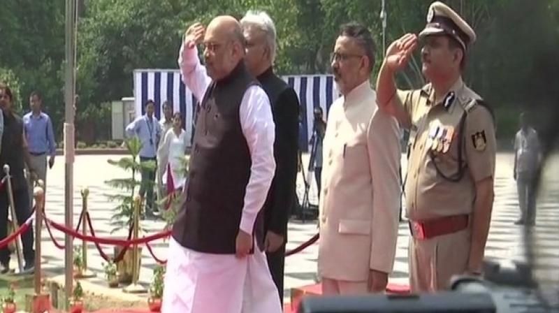 Union Home Minister Amit Shah on Sunday visited the National Police Memorial to pay tribute to the policemen who sacrificed their lives in the line of duty. (Photo: ANI) Union Home Minister Amit Shah on Sunday visited the National Police Memorial to pay tribute to the policemen who sacrificed their lives in the line of duty. (Photo: ANI)