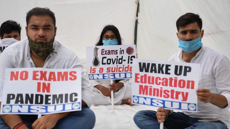 Activists of National Students Union of India (NSUI ) take part in a demonstration in front of the NSUI headquarters in New Delho. PTI Photo