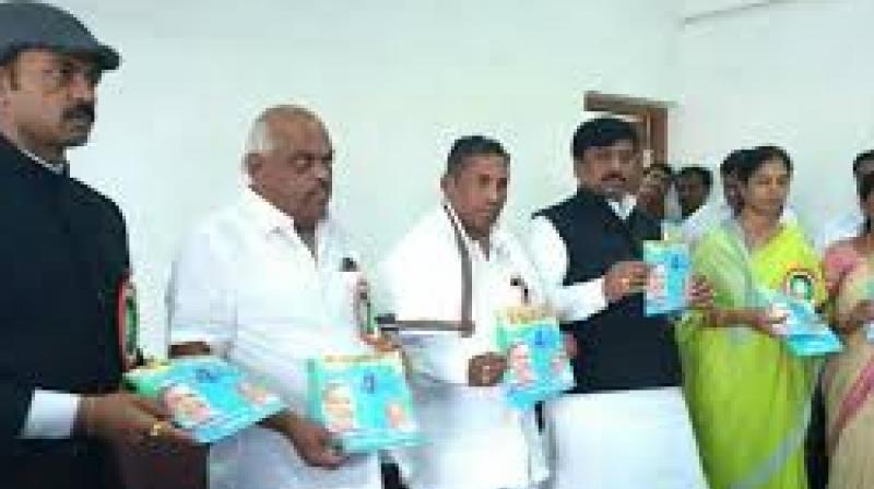 A file photo of Ramesh Kumar with K.H. Muniyappa. A file photo of Ramesh Kumar with K.H. Muniyappa.