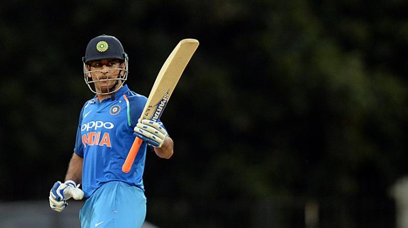 Having Dhoni, whose 341 ODI appearances makes him the most experienced player at this year’s World Cup, at number five would ensure the former India captain could nudge along before exploding in the final overs, believes Tendulkar. (Photo: AFP) Having Dhoni, whose 341 ODI appearances makes him the most experienced player at this year’s World Cup, at number five would ensure the former India captain could nudge along before exploding in the final overs, believes Tendulkar. (Photo: AFP)