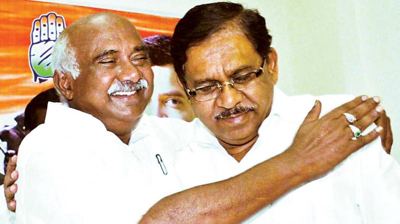 Congress leader A.H. Vishwanath with KPCC president Dr G. Parameshwar after submitting his resignation letter to him in Bengaluru on Friday. (Photo: DC) Congress leader A.H. Vishwanath with KPCC president Dr G. Parameshwar after submitting his resignation letter to him in Bengaluru on Friday. (Photo: DC)