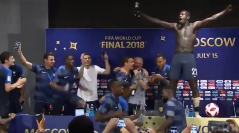 Paul Pogba and Benjamin Mendy led the charge, drenching their boss in champagne and a few other journalists present.(Photo: Screengrab) Paul Pogba and Benjamin Mendy led the charge, drenching their boss in champagne and a few other journalists present.(Photo: Screengrab)