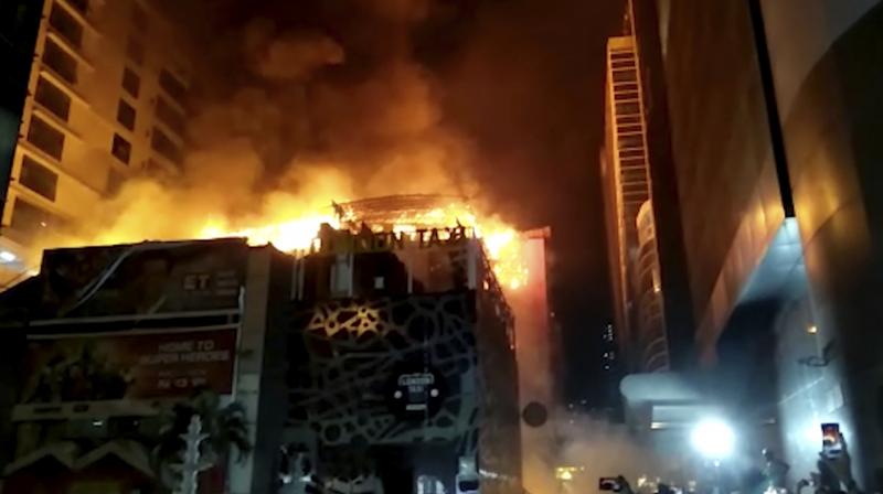 At least 14 people were killed and as many injured after a major fire in Kamala Mills Compound in Lower Parel. (Photo: AP) At least 14 people were killed and as many injured after a major fire in Kamala Mills Compound in Lower Parel. (Photo: AP)