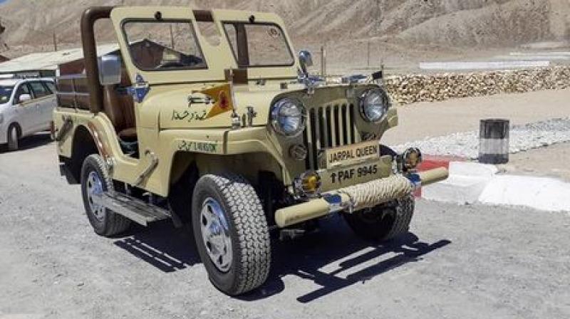 The ''Queen'', named after Jarpal in Pakistan, is actually royalty on four wheels, a Willy’s jeep, sleek, shiny and in shipshape condition, the object of lavish attention at the 3 Grenadier Regiment's camp, about 40 km from Leh. (Photo: PTI) The ''Queen'', named after Jarpal in Pakistan, is actually royalty on four wheels, a Willy’s jeep, sleek, shiny and in shipshape condition, the object of lavish attention at the 3 Grenadier Regiment's camp, about 40 km from Leh. (Photo: PTI)
