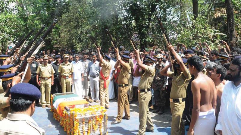 Military personnel pay last respects to martyr Kalathilveetil Sreejith at the funeral held at Paruthipulli in Palakkad on Saturday. (Photo: DC) Military personnel pay last respects to martyr Kalathilveetil Sreejith at the funeral held at Paruthipulli in Palakkad on Saturday. (Photo: DC)