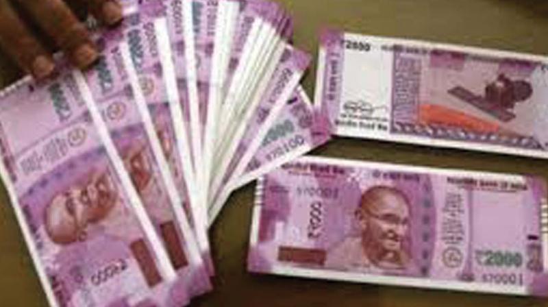 If required, the government may request the Reserve Bank of India for interim dividend of Rs 25,000-30,000 crore during the current fiscal, an official said. (Photo: Representational) If required, the government may request the Reserve Bank of India for interim dividend of Rs 25,000-30,000 crore during the current fiscal, an official said. (Photo: Representational)