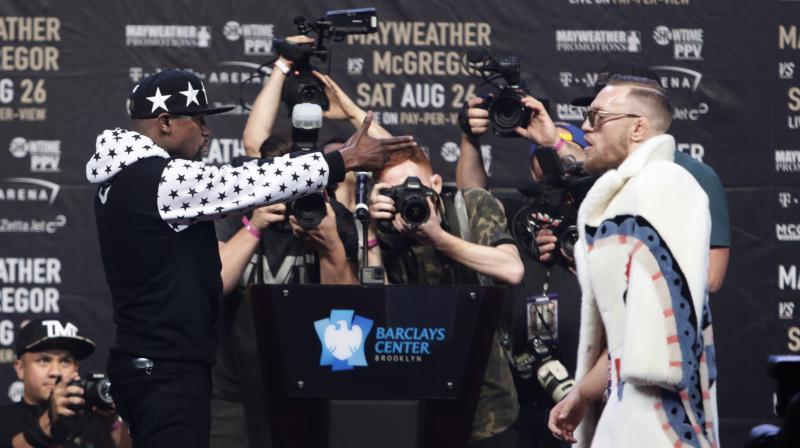 Floyd Mayweather and Conor McGregor are set to face each other in a boxing ring in Las Vegas on August 26 in what could be the richest fight in history. (Photo: AP) Floyd Mayweather and Conor McGregor are set to face each other in a boxing ring in Las Vegas on August 26 in what could be the richest fight in history. (Photo: AP)