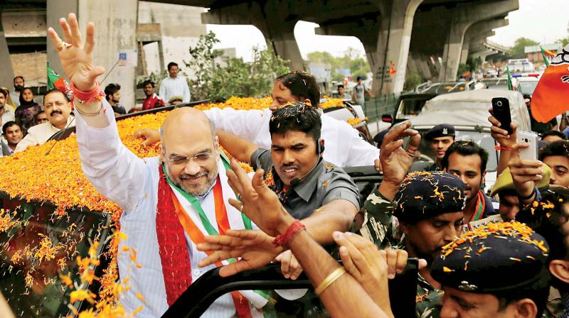 BJP national president Amit Shah gets a rousing reception in Jammu on Saturday. (Photo: PTI) BJP national president Amit Shah gets a rousing reception in Jammu on Saturday. (Photo: PTI)