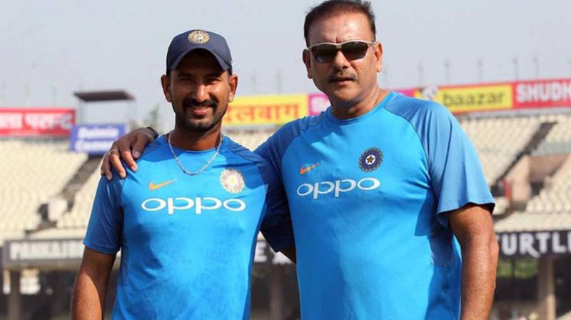 Ravi Shastri feels that Test specialist Cheteshwar Pujara should remain in the top bracket when the BCCI and Committee of Administrators (COA) thrash out the revised central contracts based on new remuneration structure. (Photo: BCCI) Ravi Shastri feels that Test specialist Cheteshwar Pujara should remain in the top bracket when the BCCI and Committee of Administrators (COA) thrash out the revised central contracts based on new remuneration structure. (Photo: BCCI)