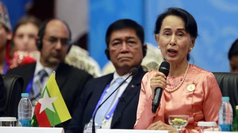 Myanmar Foreign Minister Aung San Suu Kyi, right, speaks during the Asia Europe Foreign Ministers (ASEM) meeting at Myanmar International Convention Centre Monday, Nov. 20, 2017, in Naypyitaw, Myanmar. (Photo: AP) Myanmar Foreign Minister Aung San Suu Kyi, right, speaks during the Asia Europe Foreign Ministers (ASEM) meeting at Myanmar International Convention Centre Monday, Nov. 20, 2017, in Naypyitaw, Myanmar. (Photo: AP)