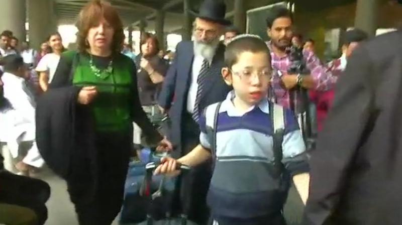 Moshe was accompanied by his grandfather Shimon Rosenberg and his wife. (Photo: ANI/Twitter) Moshe was accompanied by his grandfather Shimon Rosenberg and his wife. (Photo: ANI/Twitter)